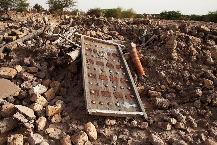 The rubble left from an ancient mausoleum destroyed by Islamist militants, is seen in Timbuktu, July 25, 2013. REUTERS/Joe PenneyFiles