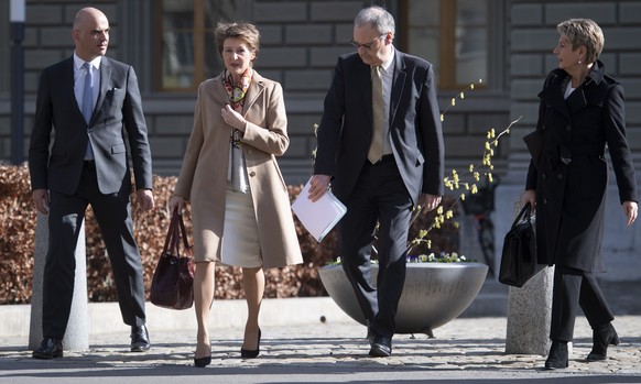 epa08292417 (L-R) Head of Switzerland&#039;s Home Affairs Department Alain Berset, President Simonetta Sommaruga, Vice President Guy Parmelin and Head of the Department of Justice and Police Karin Kel ...