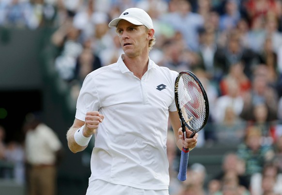 Kevin Anderson of South Africa celebrates after winning the second set of his match against Novak Djokovic of Serbia at the Wimbledon Tennis Championships in London, July 6, 2015. REUTERS/Suzanne Plun ...