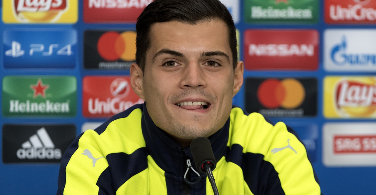 Granit Xhaka of England's Arsenal FC smiles during a press conference in the St. Jakob-Park stadium in Basel, Switzerland, on Monday, December 5, 2016. England's Arsenal FC is scheduled to p ...