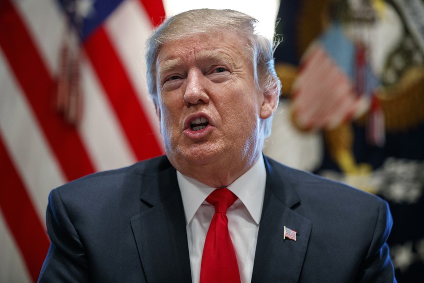 FILE - In this Feb. 1, 2019, file photo,President Donald Trump speaks during an event on human trafficking in the Cabinet Room of the White House in Washington. (AP Photo/ Evan Vucci, File)