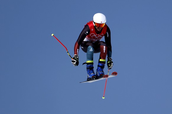 Joos Berry of Switzerland in action during the qualification run at the men&#039;s ski freestyle cross competition at the 2022 Winter Olympics in Zhangjiakou, China, on Friday, February 18, 2022. (KEY ...