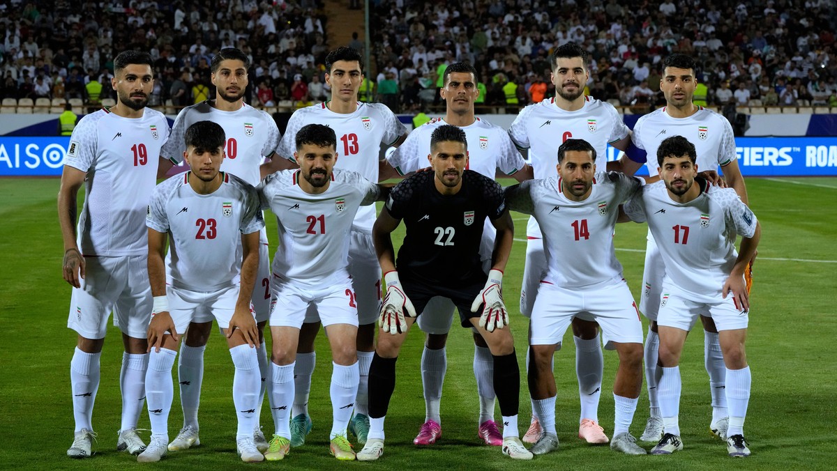 FILE - Irans's players pose for a team photo before an Asian group A qualifying soccer match against North Korea for the 2026 World Cup, June 10, 2025, at Azadi Stadium in Tehran, Iran. (AP Photo ...