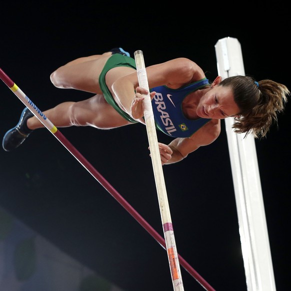 Brazil&#039;s Fabiana Murer makes a clearance during the women&#039;s pole vault final at the World Athletics Championships at the Bird&#039;s Nest stadium in Beijing, Wednesday, Aug. 26, 2015. (AP Ph ...