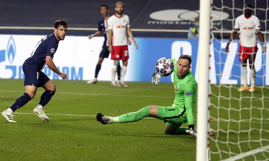 epa08611539 Juan Bernat of PSG (L) scores the 3-0 during the UEFA Champions League semi final match between RB Leipzig and Paris Saint Germain in Lisbon, Portugal, 18 August 2020. EPA/Manu Fernandez / ...