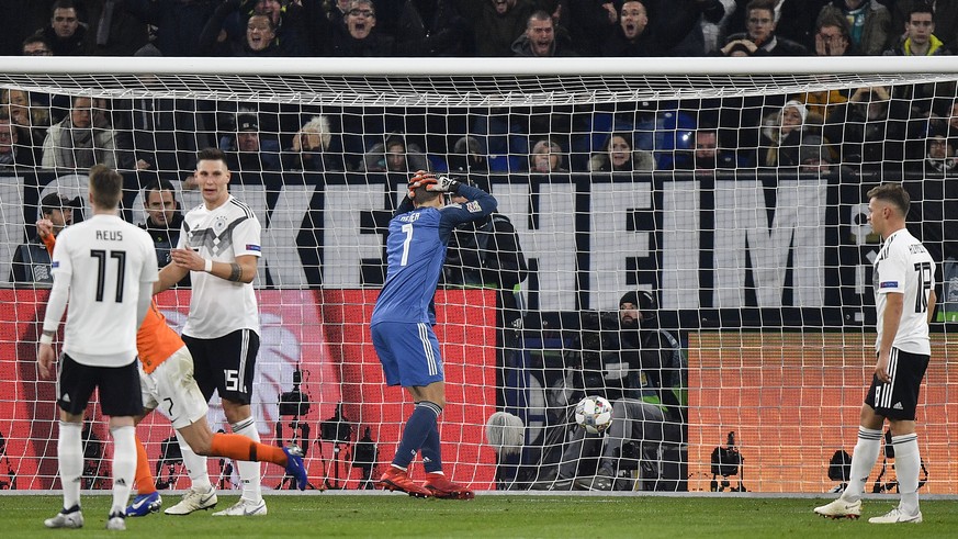 Germany&#039;s keeper Manuel Neuer puts his hands on his head after Netherland&#039;s Virgil Van Dijk scored his side&#039;s second goal in the 90th minute during the UEFA Nations League soccer match  ...