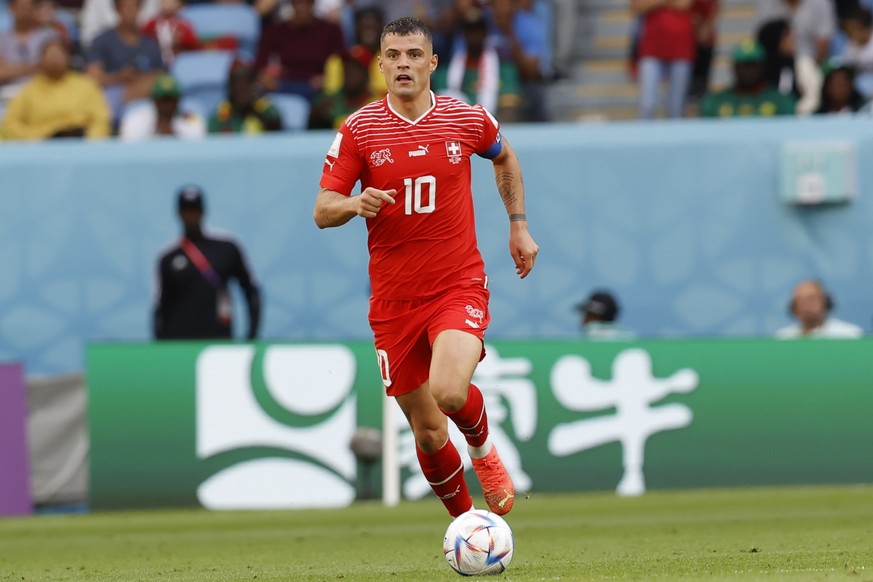 epa10324565 Granit Xhaka of Switzerland in action during the FIFA World Cup 2022 group G soccer match between Switzerland and Cameroon at Al Janoub Stadium in Al Wakrah, Qatar, 24 November 2022. EPA/R ...