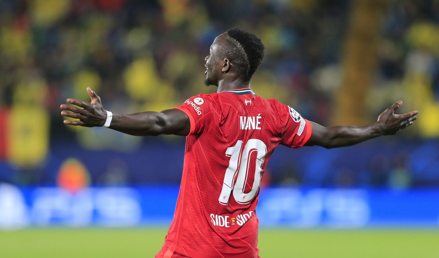 epa09925234 Liverpool&#039;s Senegalese striker Sadio Mane celebrates after scoring the 2-3 during their UEFA Champions League semifinal second leg soccer match between Villarreal CF and Liverpool FC  ...