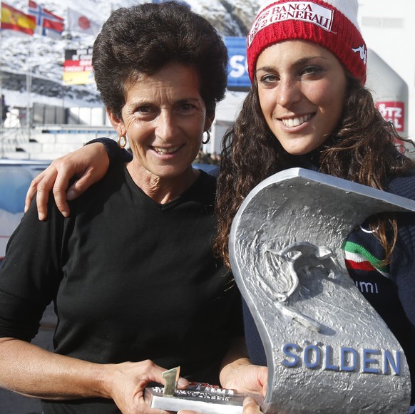 Italy&#039;s Federica Brignone poses with her mother Maria Rosa Quario after winning a Ski World Cup women&#039;s Giant Slalom in Soelden, Austria, Saturday, Oct. 24, 2015. (AP Photo/Marco Trovati)