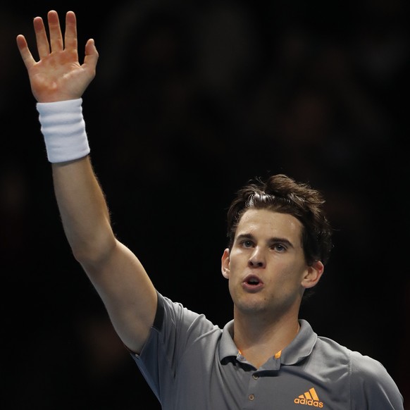 Austria&#039;s Dominic Thiem celebrates after defeating Switzerland&#039;s Roger Federer in their ATP World Tour Finals singles tennis match at the O2 Arena in London, Sunday, Nov. 10, 2019. (AP Photo ...