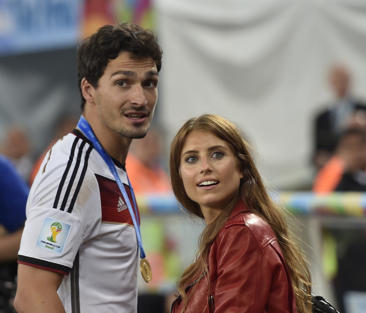 Germany's Mats Hummels stands with his partner Cathy Fischer after the World Cup final soccer match between Germany and Argentina at the Maracana Stadium in Rio de Janeiro, Brazil, Sunday, July 1 ...