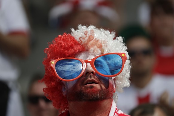 A Polish fan waits for the Euro 2016 Group C soccer match between Ukraine and Poland at the Velodrome stadium in Marseille, France, Tuesday, June 21, 2016. (AP Photo/Ariel Schalit)