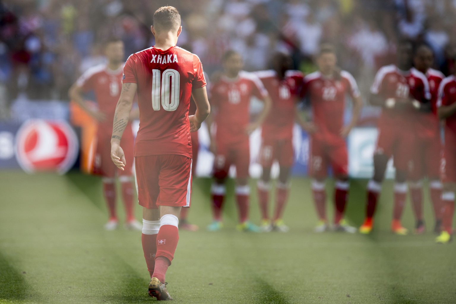 epa05390318 Swiss Granit Xhaka after he missed a penalty in the penalty shoot out in the UEFA EURO 2016 round of 16 match between Switzerland and Poland at Stade Geoffroy Guichard in Saint-Etienne, Fr ...