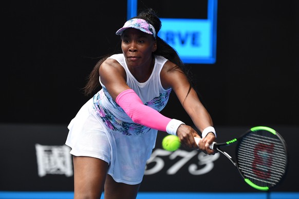 epa07285312 Venus Williams of the USA in action against Mihaela Buzarnescu of Romania during their first round women&#039;s singles match of the Australian Open Grand Slam tennis tournament in Melbour ...