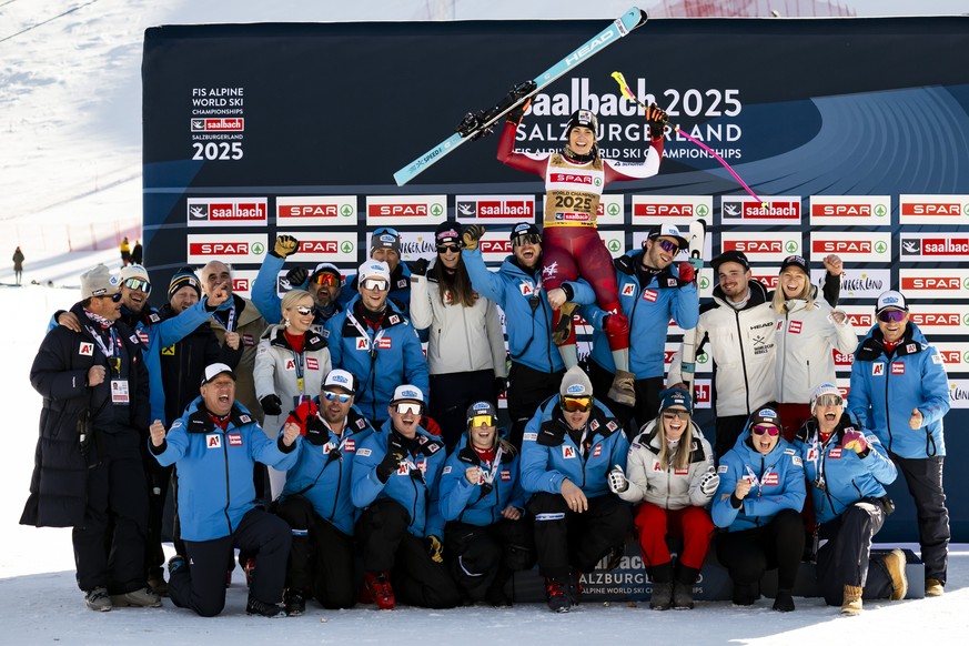 Gold medalist Stephanie Venier of Austria celebrates with Austrian team members during the podium ceremony of the women&#039;s Super G race at the 2025 FIS Alpine World Ski Championships, in Saalbach- ...