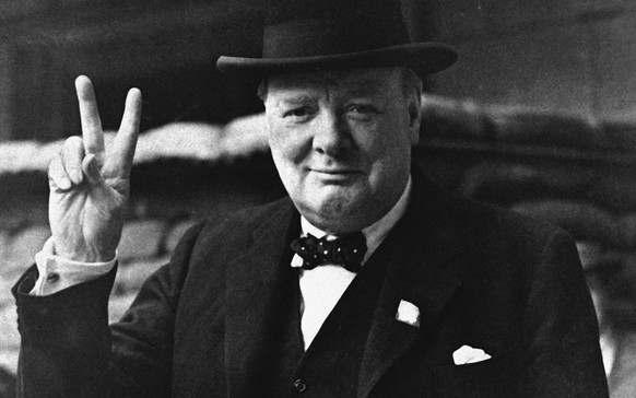 FILE - This is a Aug. 27, 1941 file photo of British Prime Minister Winston Churchill as he gives his famous &quot; V for Victory Salute&quot; . Churchill Britain&#039;s famous World War II prime mini ...