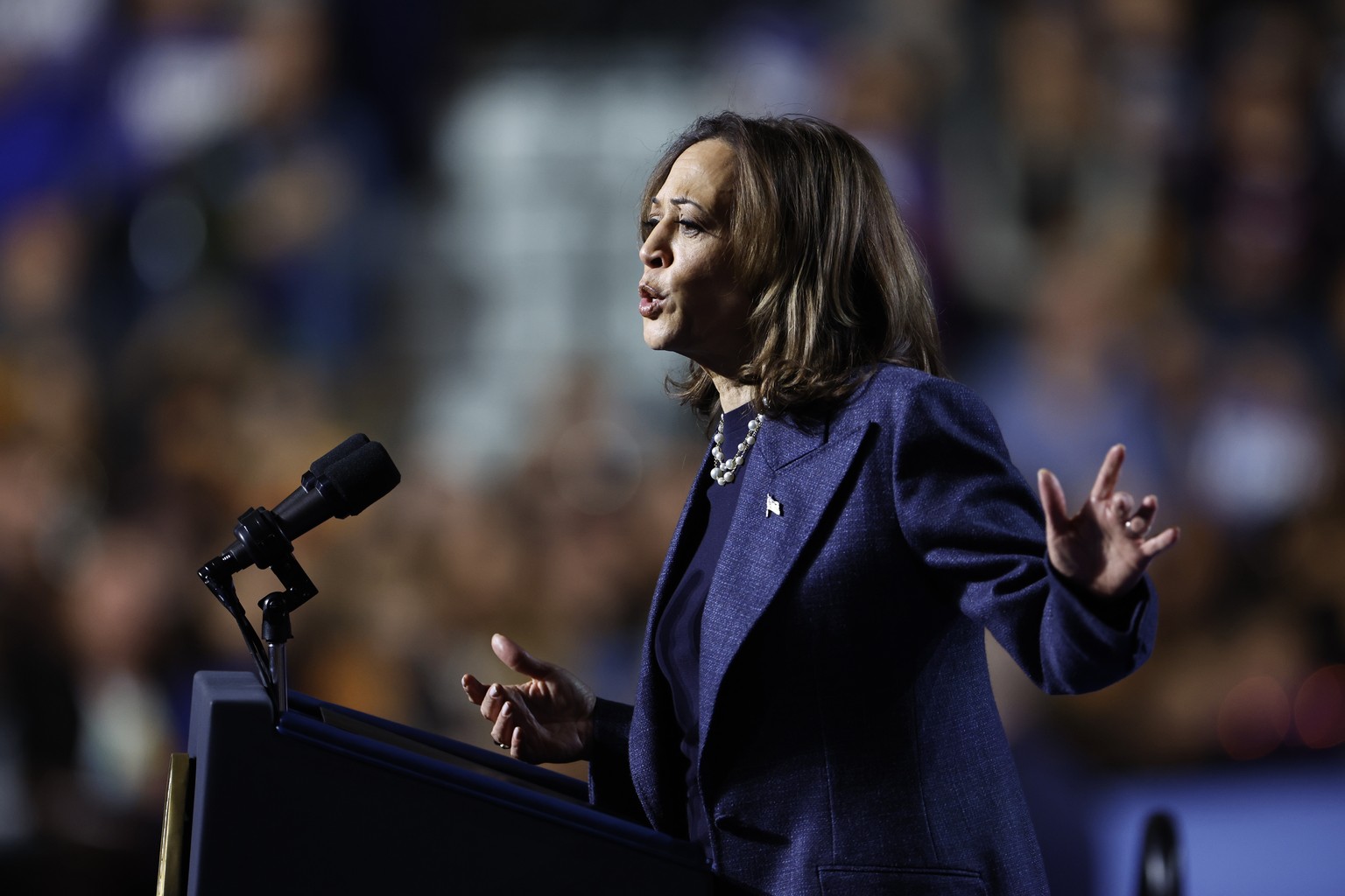 epa11700033 Democratic presidential candidate US Vice President Kamala Harris speaks during a Get Out the Vote rally in East Lansing, Michigan, USA, 03 November 2024. Vice President Harris and Republi ...