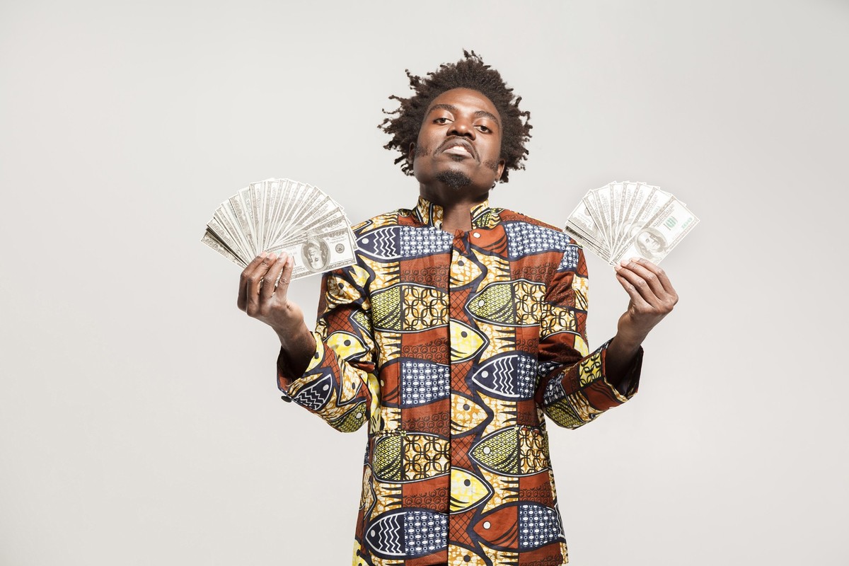 Success and richly african businessman or mafia boss. Indoor, isolated on gray background Model Released Property Released xkwx haughty, arrogant, proud, aloof, toplofty, airy, chesty, assuming, presu ...