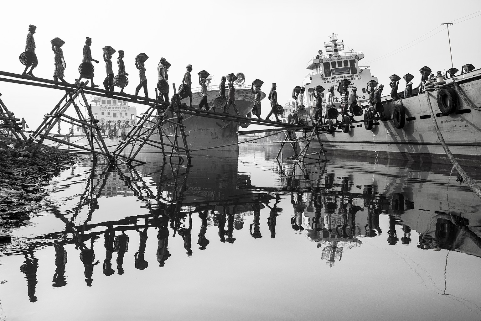 Thousands of ultra-poor people come capital city Dhaka to find works. Filed to get good works they do hard works such as coal unloading from lighter vessel at the riverside by carry on their head.