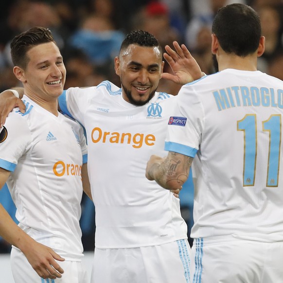 epa06695206 (l-r) Florian Thauvin, Dimitri Payet and Kostas Mitroglou of Olympique Marseille celebrates after scoring a goal against RB Salzburg during the UEFA Europa League semi final, first leg soc ...