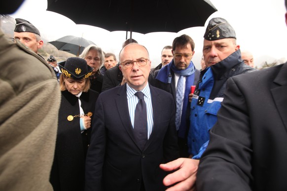 LA SEYNE LES ALPES, FRANCE- MARCH 24: French Interior Minister Bernard Cazeneuve arrives near the site of the Germanwings plane crash near the French Alps on March 24, 2015 in La Seyne les Alpes, Fran ...