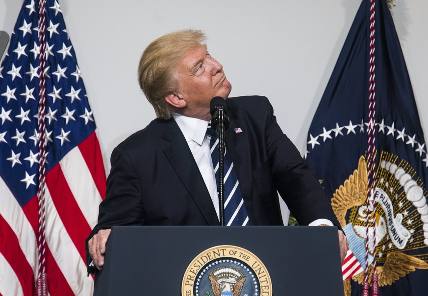 epa05862468 US President Donald J. Trump speaks at the National Republican Congressional Committee March Dinner at the National Building Museum in Washington, DC, USA, 21 March 2017. The long-awaited  ...