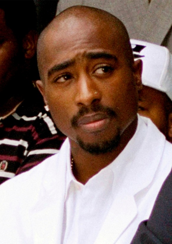 FILE - Rapper Tupac Shakur attends a voter registration event in South Central Los Angeles, Aug. 15, 1996. (AP Photo/Frank Wiese, File)
Tupac Shakur