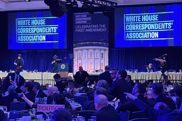 Members of the U.S. Secret Service counter assault team stand on the stage after a shooting incident outside the ballroom during the White House Correspondents Dinner, Saturday, April 25, 2026, in Was ...