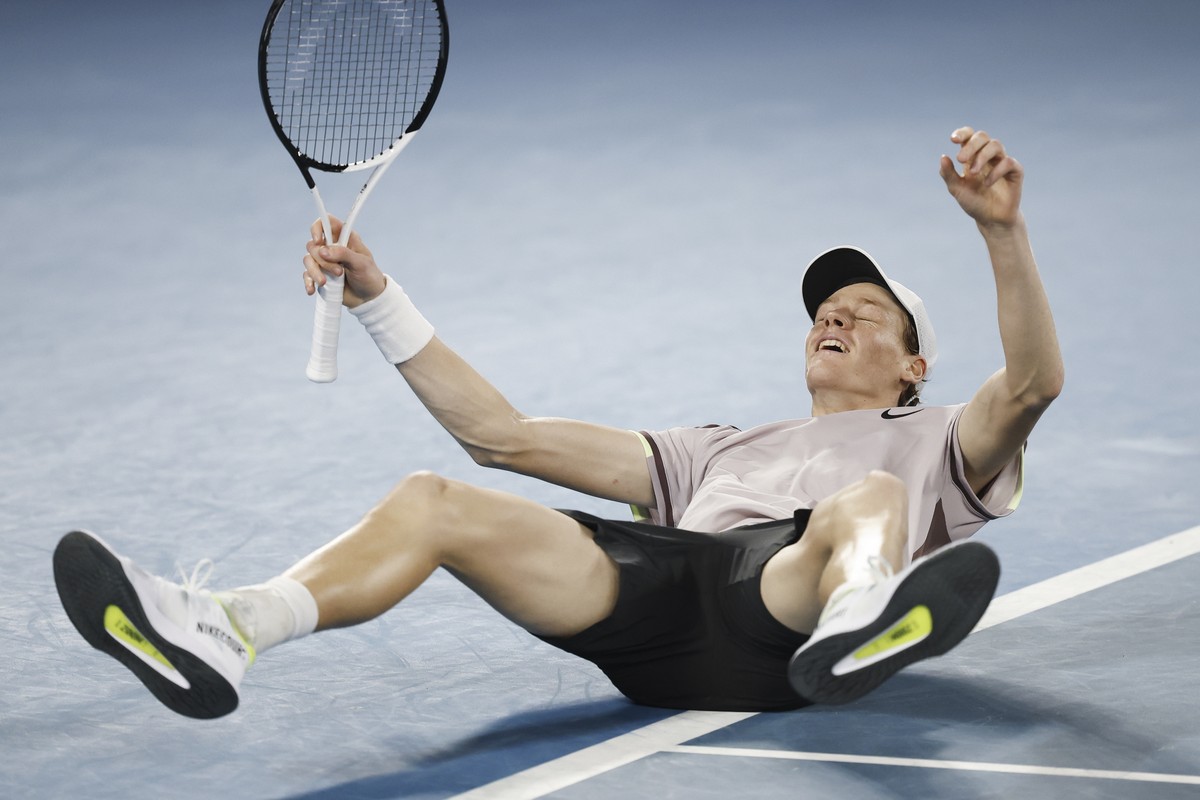 epa11110363 Jannik Sinner of Italy celebrates after winning his Men's Singles final match against Daniil Medvedev of Russia at the 2024 Australian Open tennis tournament, in Melbourne, Australia, ...