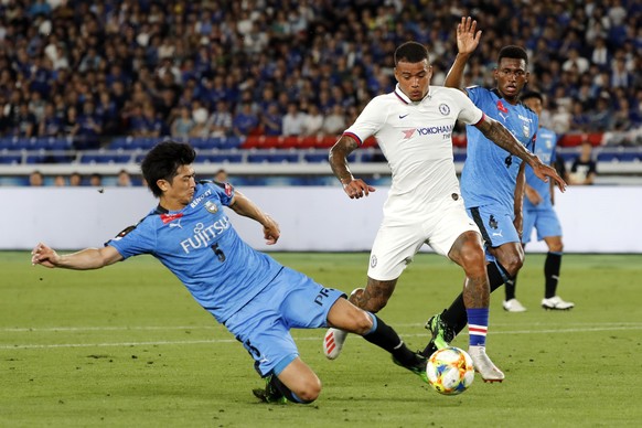 Chelsea&#039;s Kenedy right, and Frontale&#039;s Shogo Taniguchi, left, compete the ball during a soccer match between Chelsea FC and Kawasaki Frontale in Yokohama Friday, July 19, 2019. (AP Photo/Eug ...