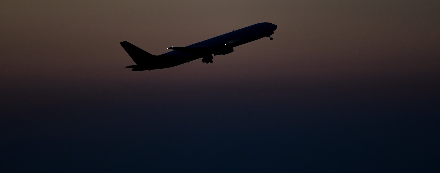 epa07654699 Airplane of Titan airways containing deported Afghans takes off of the Leipzig /Halle Airport, Schkeuditz, Germany, 17 June 2019. 16 Afghans asylum seekers are deported from Germany as par ...