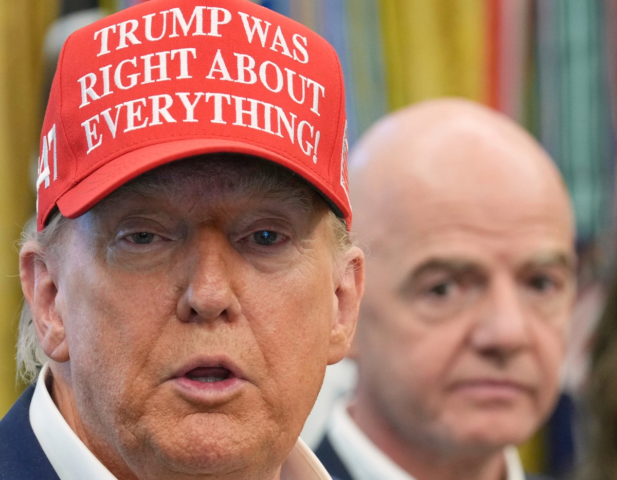 FILE - President Donald Trump speaks as FIFA President Gianni Infantino listens in the Oval Office of the White House, Friday, Aug. 22, 2025, in Washington. (AP Photo/Jacquelyn Martin, File)
Donald Tr ...