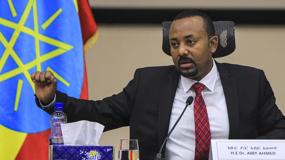 epa08852855 Ethiopian Prime Minister Abiy Ahmed speaks during a question and answer session in parliament, Addis Ababa, Ethiopia 30 November 2020. Ethiopia