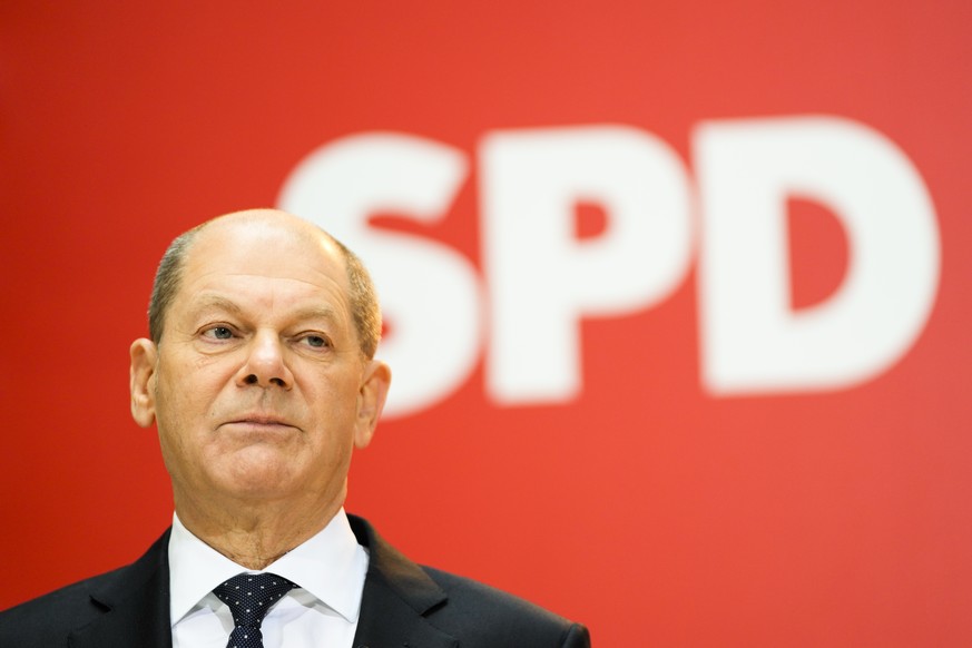 Designated new German chancellor Olaf Scholz presents the ministers of his Social Democratic Party, SPD, for the new German government during a news conference at the party&#039;s headquarters in Berl ...