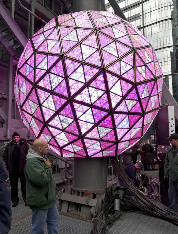 Workers in New York&#039;s Times Square perform a test on Sunday, Dec. 30, 2018, of the New Year&#039;s Eve ball that will be lit and sent up a 130-foot pole atop One Times Square to mark the start of ...