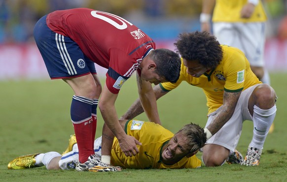 FILE - In this Neymar’s Burden file photo, Brazil&#039;s Neymar screams after being fouled during the World Cup quarterfinal soccer match between Brazil and Colombia at the Arena Castelao in Fortaleza ...