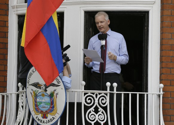 FILE - In this Sunday, Aug. 19, 2012 file photo, Julian Assange, founder of WikiLeaks makes a statement from a balcony of the Equador Embassy in London. Judge Vanessa Baraitser has ruled that Julian A ...