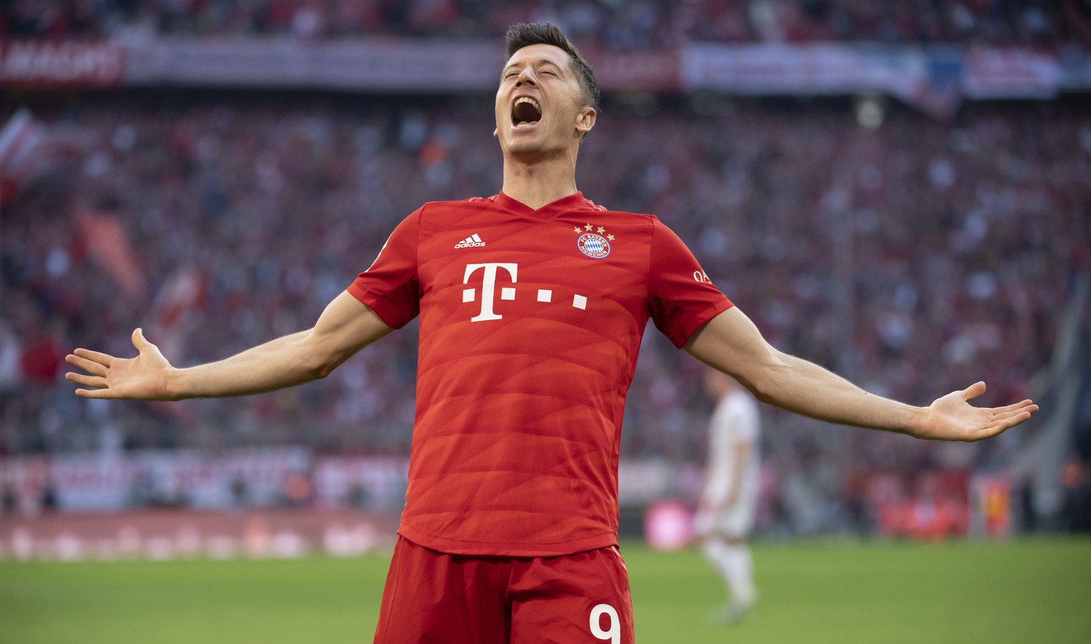 Munich&#039;s Robert Lewandowski celebrates after scoring his side second goal during the German Bundesliga soccer match between FC Bayern Munich and 1. FC Union Berlin in Munich, Saturday, Oct. 26, 2 ...