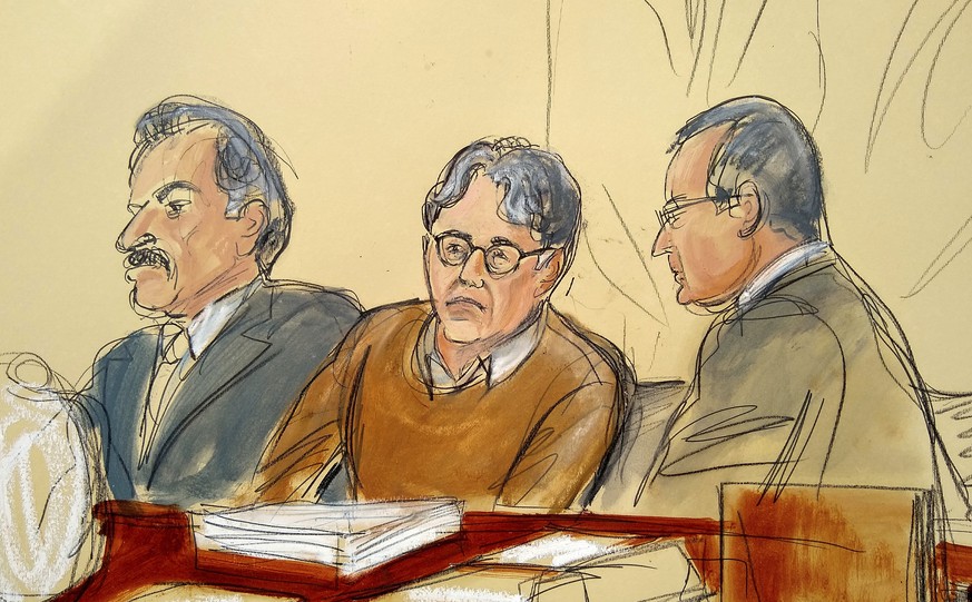 FILE - In this Tuesday, May 7, 2019, file courtroom drawing, defendant Keith Raniere, center, leader of the secretive group NXIVM, is seated between his attorneys Paul DerOhannesian, left, and Marc Ag ...