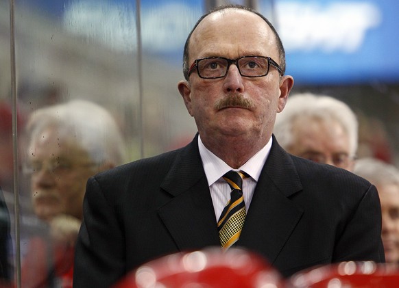 FILE - This is a Nov. 20, 2011, file photo showing then-Carolina Hurricanes assistant coach Dave Lewis looks on during the first period of an NHL hockey game against the Toronto Maple Leafs in Raleigh ...