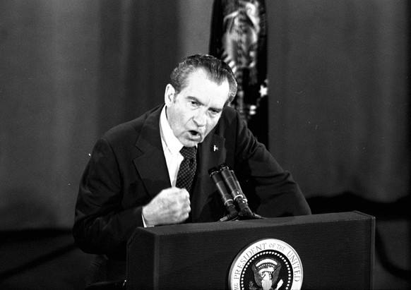 FILE - In this March 19, 1974 file photo, President Richard Nixon pounds his fist during a news conference in Houston, Texas. In Watergate, the smoking gun was a White House tape proving that Richard  ...