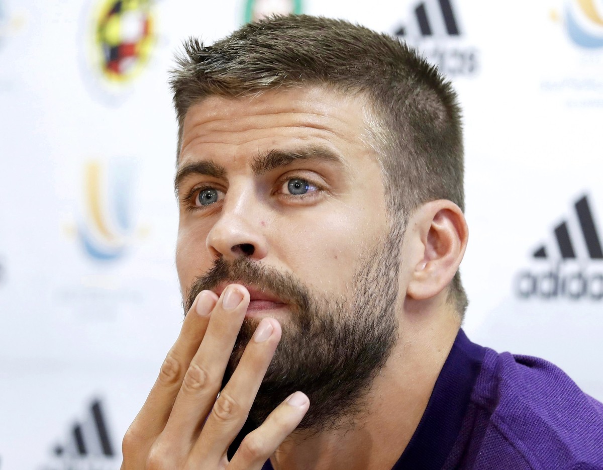 epa06943719 FC Barcelona's defender Gerard Pique attends a press conference in Barcelona, Spain, 11 August 2018. FC Barcelona will face Sevilla FC in the Spanish Super Cup at Stade Ibn Battouta i ...