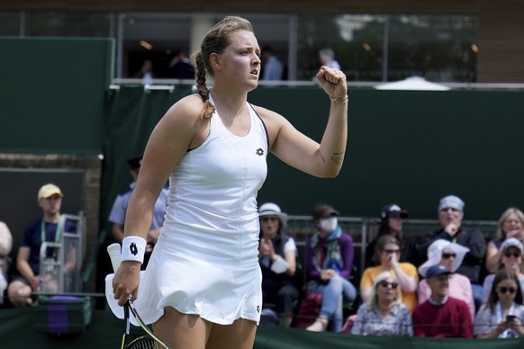 Germany's Jule Niemeier celebrates winning a point against Ukraine's Lesia Tsurenko in a third round women's singles match on day five of the Wimbledon tennis championships in London, F ...