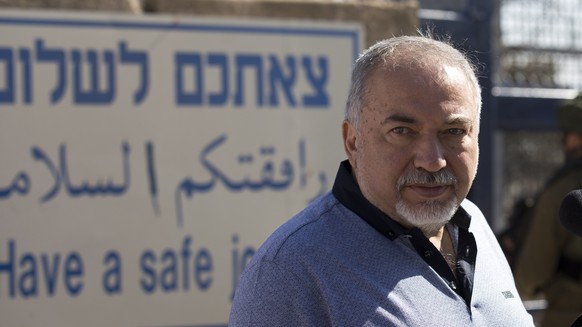 epa07050405 Israeli Defense Minister Avigdor Lieberman speaks during a visit at the Israeli side of the Quneitra crossing, the only border crossing between Israeli and Syria, 27 September 2018. Accord ...