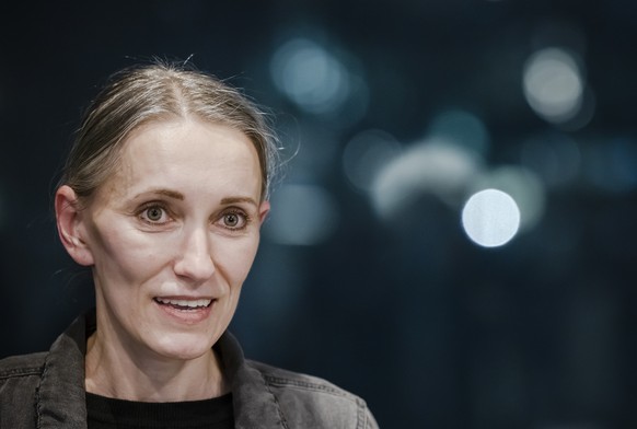 epa09769979 Natallia Hersche speaks to the media at Zurich Airport in Zurich, Switzerland, 18 February 2022. Swiss-Belarusian dual citizen Natallia Hersche has been released after 17 months in prison  ...