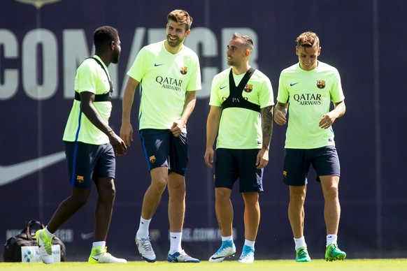 epa05991172 FC Barcelona players (L-R) Samuel Umtiti, Gerard Pique, Paco Alcacer, and Lucas Digne attend their team&#039;s training session at Joan Gamper Sports City in Sant Joan Despi, near Barcelon ...