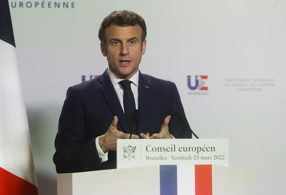 epa09849614 French President Emmanuel Macron gives a press conference at the end of a two day European Council Summit in Brussels, Belgium, 25 March 2022. EPA/OLIVIER HOSLET