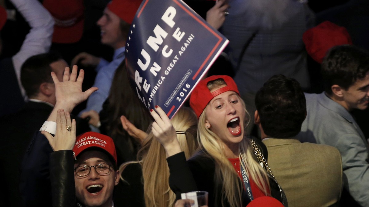 Trump supporters celebrate as they watch election returns come in at Republican U.S. presidential nominee Donald Trump's election night rally in Manhattan, New York, U.S., November 8, 2016. REUTE ...
