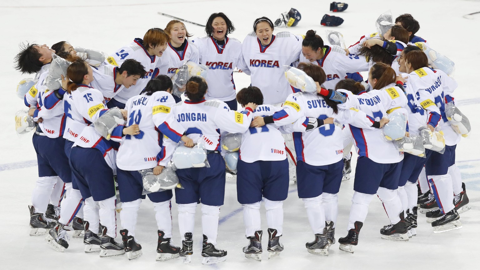 epa05896623 South Korean players celebrate winning the title at the International Ice Hockey Federation Women&#039;s World Championship Division II Group A tournament at Kwandong Hockey Centre in Gang ...