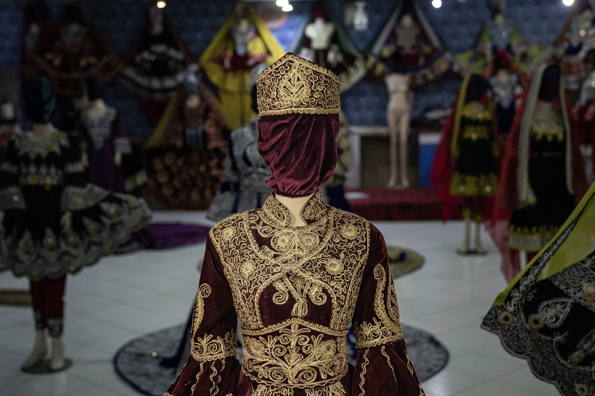 A mannequin's head is covered in a woman dress shop in Kabul, Afghanistan, Monday, Dec. 26, 2022. Under the Taliban, the mannequins in women's dress shops across the Afghan capital Kabul are ...